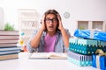 Young male student preparing for exams during Christmas Royalty Free Stock Photo