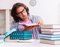 Young male student preparing for exams during Christmas Royalty Free Stock Photo