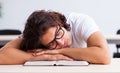 Young male student sitting in the classroom Royalty Free Stock Photo