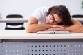 Young male student sitting in the classroom Royalty Free Stock Photo