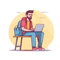 Young male student using laptop seated desk. Casual attire backpack jeans focused