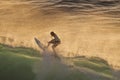 Young male surfer riding a big wave at Honolua Bay. Royalty Free Stock Photo