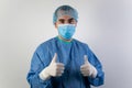 Young male surgeon stand health care emergency profession help people thumbs up