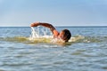 Young male swimming