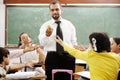 Young male teacher with children