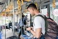 Young male tourist using the mobile phone