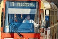 Young male tram driver going to the main train station on a sunny day in Bratislava, Slovakia
