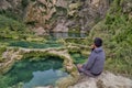 Young male watching the beautiful Waterfall hidden in the & x28;EL SALTO-EL MECO& x29; san luis potosi Mexico