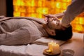 Handsome bearded caucasian man getting head massage in spa salon Royalty Free Stock Photo