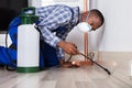 Male Worker Spraying Pesticide Royalty Free Stock Photo