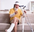 Young man after accident recovering at home Royalty Free Stock Photo