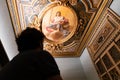 Young man admiring art at a museum | Detail of ancient Roman paintings and art | vintage civilizations | Louvre Abu Dhabi