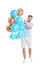 Young man with air balloons Royalty Free Stock Photo