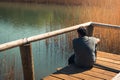 A young man alone on a lake, portrait, la arboleda, basque country Royalty Free Stock Photo