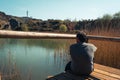 A young man alone on a lake, portrait, la arboleda, basque country Royalty Free Stock Photo