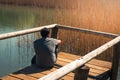 A young man alone on a lake, portrait, la arboleda, basque country Royalty Free Stock Photo