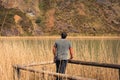 A young man alone on a lake, portrait, la arboleda, basque country Royalty Free Stock Photo