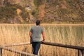 A young man alone on a lake, portrait, la arboleda, basque country Royalty Free Stock Photo