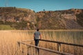 A young man alone on a lake, portrait, la arboleda, basque country Royalty Free Stock Photo