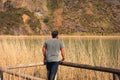 A young man alone on a lake, portrait, la arboleda, basque country Royalty Free Stock Photo