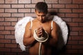 Young man with angel wings. Royalty Free Stock Photo