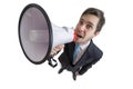 Young man is announcing a message with megaphone. View from above. Isolated on white background