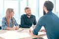 young man answering questions from managers during an interview. Royalty Free Stock Photo