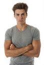 Young man with arms folded