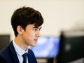 A young man focussing on his computer monitor Royalty Free Stock Photo