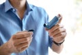 Young man with asthma inhaler indoors Royalty Free Stock Photo