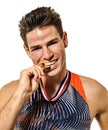 Young man athletics athetle gold medalist isolated white background