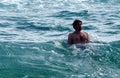 Young Man In Atlantic Ocean On Ilha De Tavira Portugal