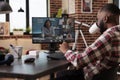 Young man attending business videocall Royalty Free Stock Photo