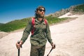 Young Man with backpack hiking outdoor Travel Lifestyle concept Royalty Free Stock Photo