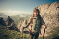 Young Man with backpack hiking outdoor Travel Royalty Free Stock Photo