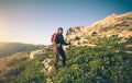 Young Man with backpack mountaineering outdoor Royalty Free Stock Photo