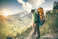 Young Man with backpack relaxing outdoor Travel Royalty Free Stock Photo