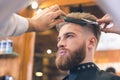 Young Man in Barber Shop Hair Care Service Concept Royalty Free Stock Photo