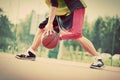 Young man on basketball court dribbling with ball. Vintage