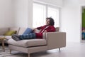 Young man in bathrobe enjoying free time Royalty Free Stock Photo