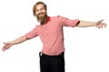 The young man with a beard of the European appearance smiles on a white background in a red shirt and black trousers with braces Royalty Free Stock Photo