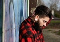 Young man with beard and piercings outdoors Royalty Free Stock Photo