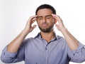 Young Man with Beard suffering Headache