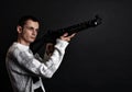 Young man with big gun Royalty Free Stock Photo