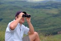 Young man with binoculars