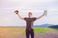 Young man with binoculars and map Royalty Free Stock Photo