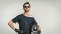 Motorbiker Posing In Studio, Isolated On Grey