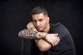 Young man with black t-shirt and tattoos Royalty Free Stock Photo