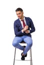 Young man in blue business jacket and jeans