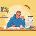 A young man in a blue hoodie is studying at a desk. He is writing in an open book while Royalty Free Stock Photo